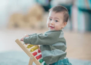 Baby,Wooden toy,Wooden rack,Row of pegs